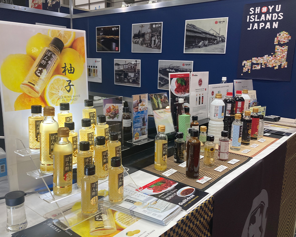 报告:第七届“日本食品”出口博览会，全国酱油工业协同组合联合会(全酱工联)展区内出展。插图5
